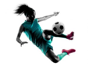 Picture of a female playing soccer